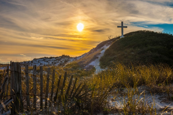 cross on beach dune